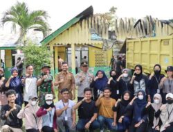 Polri dan TNI Giat Baksos Bersihkan Serpihan Bangunan yang Terbakar
