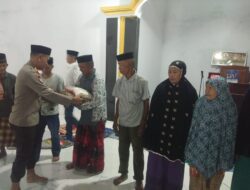 Polres Takalar Gelar Jumat Curhat dan Berbagi Paket Sembako di Desa Laguruda