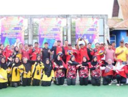 Pembukaan Turnamen Bola Voli Antar Guru SD dan SMP dengan Servis Bola Pertama oleh Bupati Bengkalis